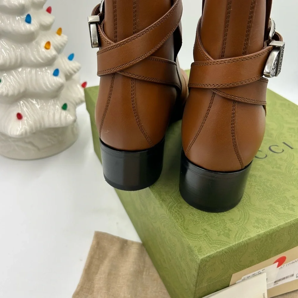 Men’s Gucci, leather ankle boots with buckle size 9 made in Italy